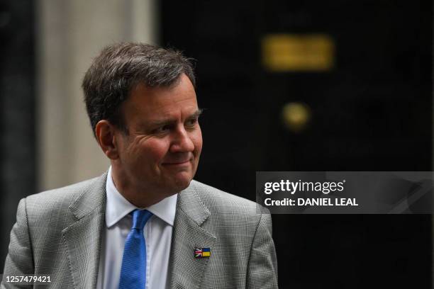 Britain's Minister without Portfolio and Conservative Party Chair Greg Hands leaves at the end of a cabinet meeting at 10 Downing Street in central...