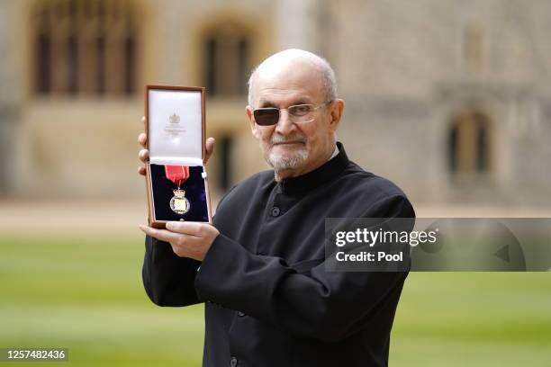 Sir Salman Rushdie after being made a Companion of Honour by the Princess Royal, during an investiture ceremony at Windsor Castle on May 23, 2023 in...