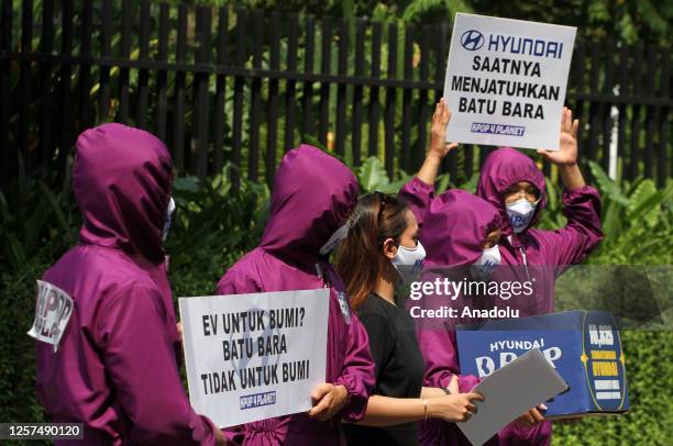Kpop fans and creative action members, holding banners, gather to stage demonstration for demand that Hyundai stop its plan to use aluminum produced...