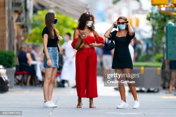 Robin Holzken, Marquita Pring and Brooks Nader are seen in Tribeca on July 21, 2020 in New York City.