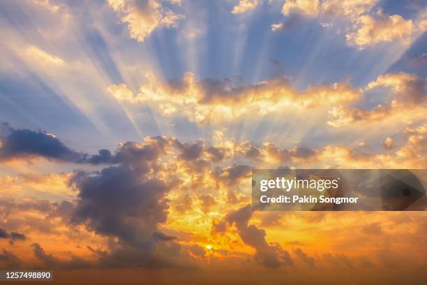 colorful clouds on the dramatic sunrise sky. - rainbow clouds stock pictures, royalty-free photos & images