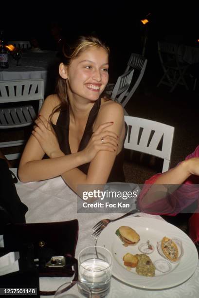 Laetitia Casta attends a dinner during the 52th Cannes Film Festival on May 1999, in Cannes, France.