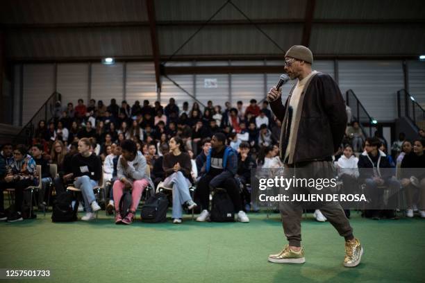 French rapper and actor Didier Morville aka JoeyStarr meets students to discuss about his book "Le petit Didier" at the school Jean Zay, in...