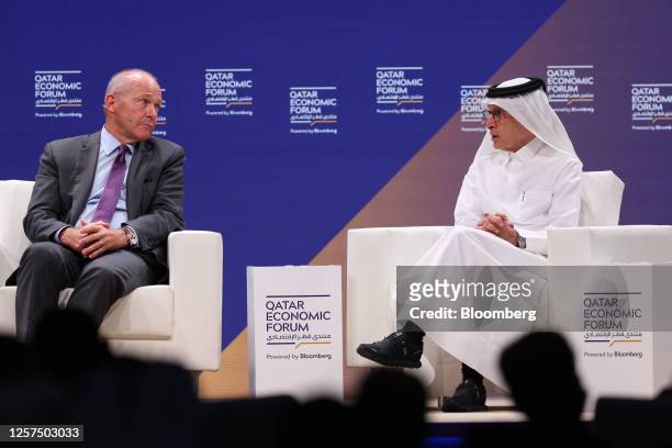 Dave Calhoun, chief executive officer of Boeing Co., left, and Akbar Al Baker, chief executive officer of Qatar Airways, during a panel session at...