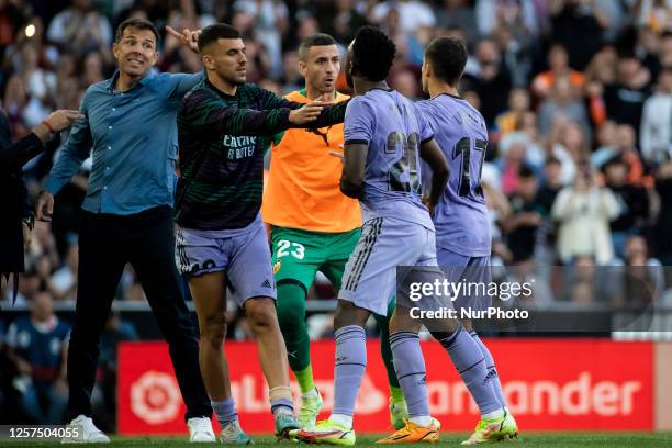 Head coach of Valencia CF Ruben Baraja reacts to Vinicius Paixao de Oliveira Junior, Vinicius Jr, of Real Madrid and Lucas Vazquez of Real Madrid...