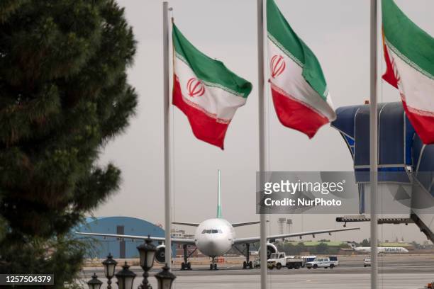 An Iranian Mahan Air Airlines aircraft is pictured at Tehran's International Mehrabad Airport, during an official farewell ceremony, May 22, 2023.