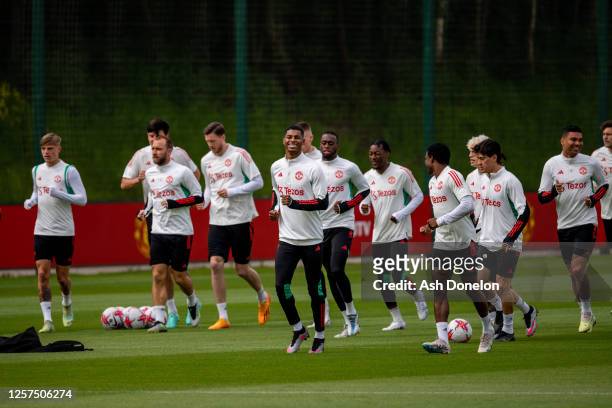 Marcus Rashford of Manchester United & team-mates in action during a first team training session at Carrington Training Ground on May 23, 2023 in...