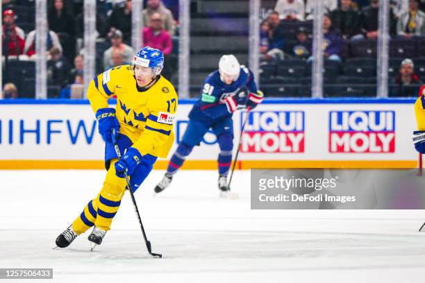 Par Lindholm of Sweden controls the ball during the 2023 IIHF Ice Hockey World Championship Finland - Latvia game between Sweden and United States at...