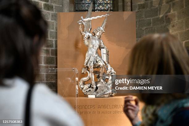 Silver archangel Saint Michel is on display during the exhibition "The Archangel's Residence, 1000 years of history and creation at the Abbey of...
