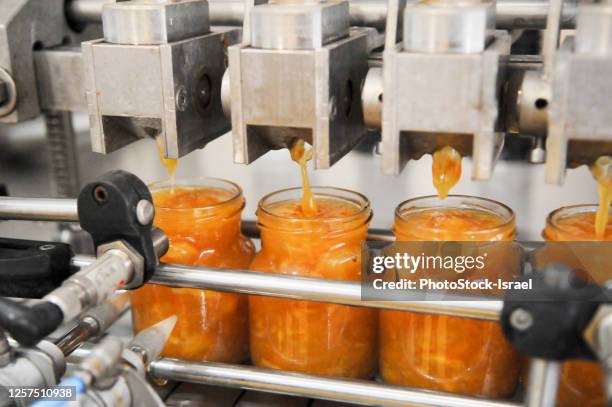 preserve bottling machinery - canning stock pictures, royalty-free photos & images