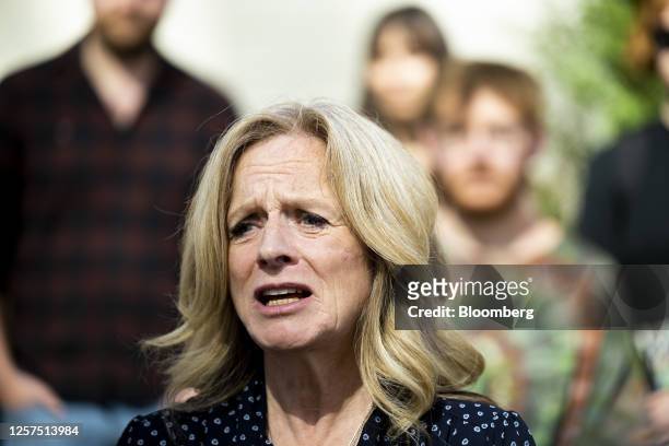 Rachel Notley, Alberta New Democratic Party candidate for Alberta premier, speaks with members of the members of the media after voting at an advance...