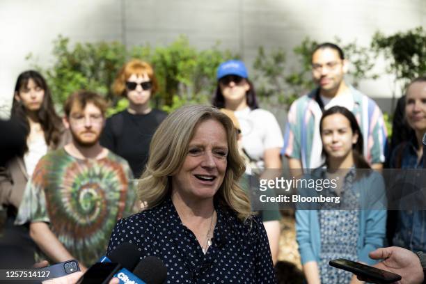 Rachel Notley, Alberta New Democratic Party candidate for Alberta premier, speaks with members of the media after voting at an advance polling...