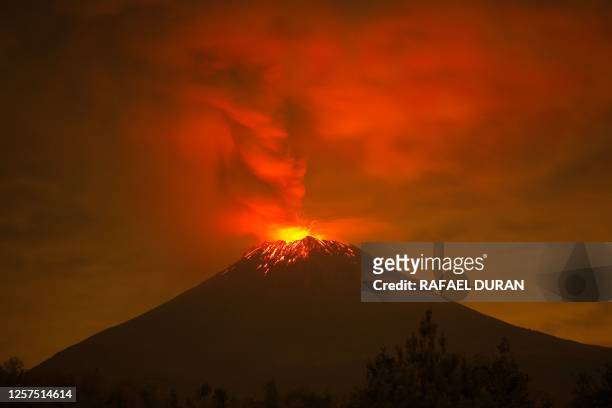 Incandescent materials, ash and smoke are spewed from the Popocatepetl volcano as seen from the San Nicolas de los Ranchos community, state of...