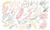 vector autumn illustration of multi-colored doodle leaves on a white background,