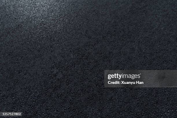 full frame shot of asphalt road - asphalt stock-fotos und bilder