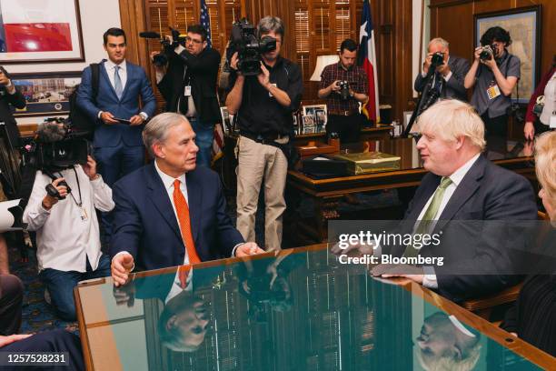 Greg Abbott, governor of Texas, left, and Boris Johnson, former UK prime minister, during a meeting at the Texas State Capitol in Austin, Texas, US,...