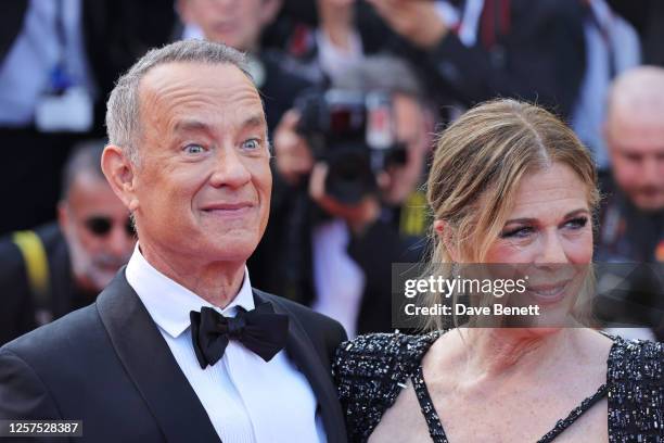 Tom Hanks and Rita Wilson attend the "Asteroid City" red carpet during the 76th annual Cannes film festival at Palais des Festivals on May 23, 2023...