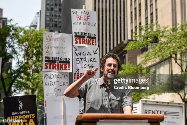 Playwright Tony Kushner with the Writers Guild of America members and supporters on a picket line outside NBCUniversal headquarters at 30 Rockefeller...
