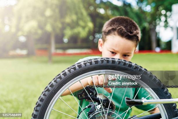 Kid Racking A Bike 547 Kid Broken Bike Stock Photos, High-Res Pictures, and Images - Getty ...