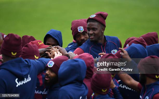 West Indies captain Jason Holder huddles with his teammates prior to a West Indies Nets Session at Emirates Old Trafford on July 22, 2020 in...