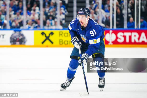 Juho Lammikko of Finland controls the ball during the 2023 IIHF Ice Hockey World Championship Finland - Latvia game between Finland and Denmark at...