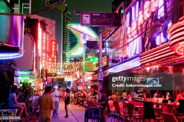 red-light entertainment area - bangkok nightlife stock pictures, royalty-free photos & images