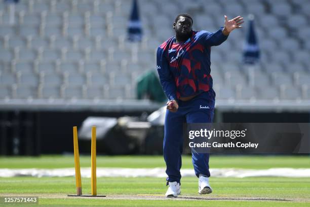 Rahkeem Cornwall of West Indies bowls during a West Indies Nets Session at Emirates Old Trafford on July 22, 2020 in Manchester, England.