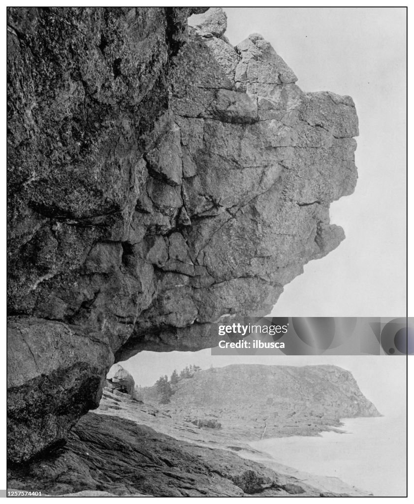 Antique black and white photo: Hanging Rock, Monhegan, Maine