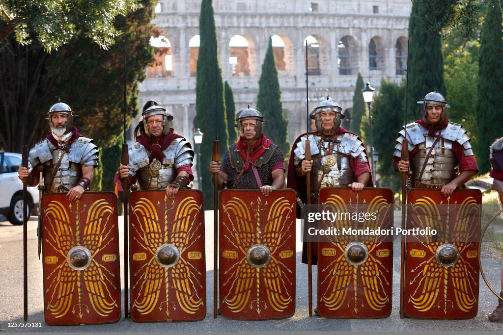 Italy Roman reenactment group in front of Coliseum