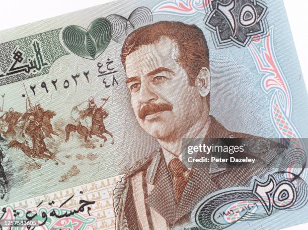 In this photo illustration, a close up of Saddam Hussein on a banknote photographed on July 22,2020 in London,England.