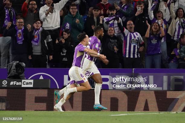 Real Valladolid's Canadian forward Cyle Larin celebrates with Real Valladolid's Spanish midfielder Alvaro Aguado after scoring his team's second goal...