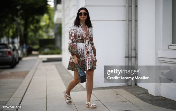 Milena Karl wearing Zimmermann dress, Chanel bag and sandals and Bottega Veneta shades on July 22, 2020 in Hamburg, Germany.