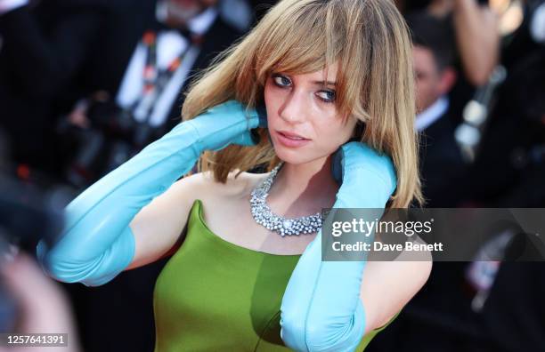 Maya Hawke attends the "Asteroid City" red carpet during the 76th annual Cannes film festival at Palais des Festivals on May 23, 2023 in Cannes,...