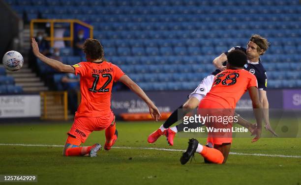 Jon Dadi Bodvarsson of Millwall scores the fourth goal during the Sky Bet Championship match between Millwall and Huddersfield Town at The Den on...