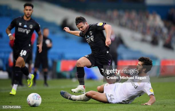 Josh Cullen of Charlton Athletic is challenged by Pascal Struijk of Leeds United during the Sky Bet Championship match between Leeds United and...