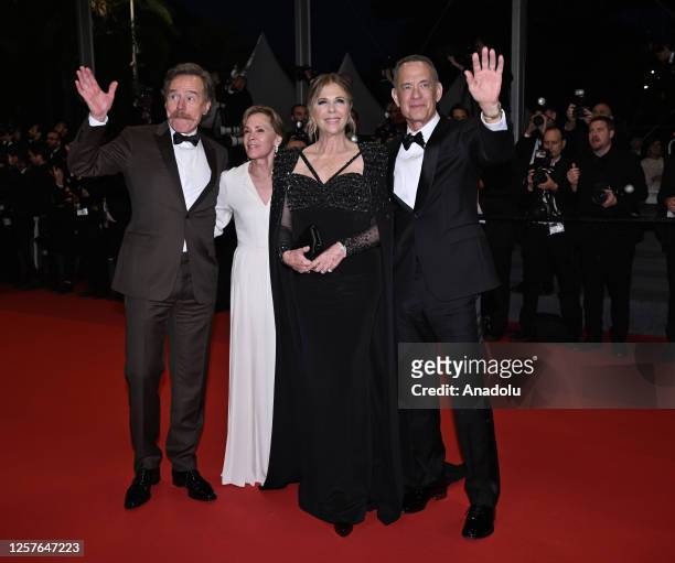 Actor Bryan Cranston, his wife actress Robin Dearden, US actress Rita Wilson and US actor Tom Hanks leave after the premiere of the film Asteroid...