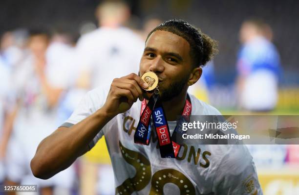 Tyler Roberts of Leeds United celebrates kissing the medal after the Sky Bet Championship match between Leeds United and Charlton Athletic at Elland...