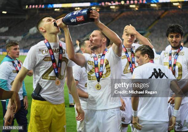 Goalkeeper Illan Meslier of Leeds United and Luke Ayling of Leeds United celebrate after the Sky Bet Championship match between Leeds United and...