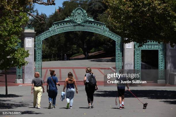 People walk towards Sather Gate on the U.C. Berkeley campus on July 22, 2020 in Berkeley, California. U.C. Berkeley announced plans on Tuesday to...