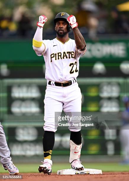 Andrew McCutchen of the Pittsburgh Pirates reacts after hitting a double in the first inning against the Texas Rangers at PNC Park on May 23, 2023 in...