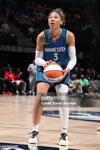 Aerial Powers of the Minnesota Lynx dribbles the ball during the game against the Atlanta Dream on May 23, 2023 at Target Center in Minneapolis,...