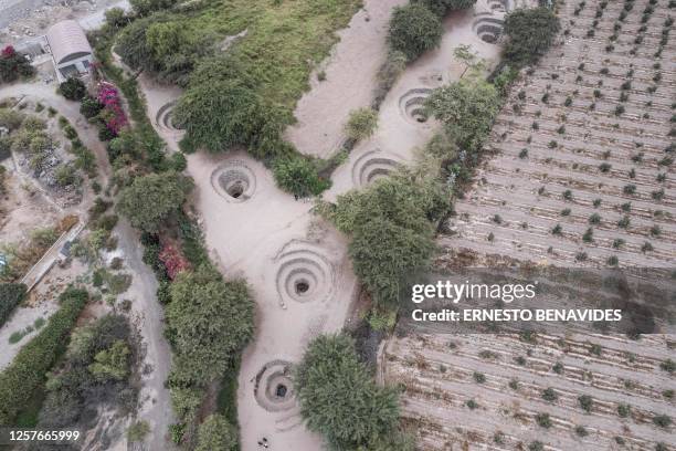 View of the Cantalloq aqueducts, built by people belonging to the Nazca culture, around 1600 years ago in Nazca, southern Peru on May 17, 2023. The...