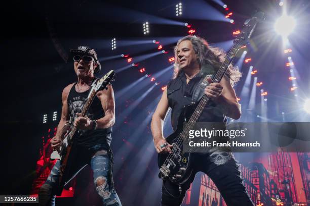 Rudolf Schenker and Pawel Maciwoda of the German band Scorpions perform live on stage during a concert at the Mercedes-Benz Arena on May 23, 2023 in...