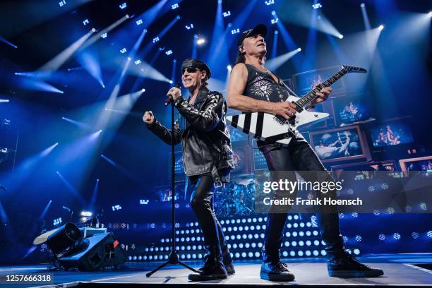 Klaus Meine and Matthias Jabs of the German band Scorpions perform live on stage during a concert at the Mercedes-Benz Arena on May 23, 2023 in...