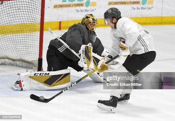 Reid Duke of the Vegas Golden Knights takes a shot against teammate Marc-Andre Fleury during a training camp practice at City National Arena on July...