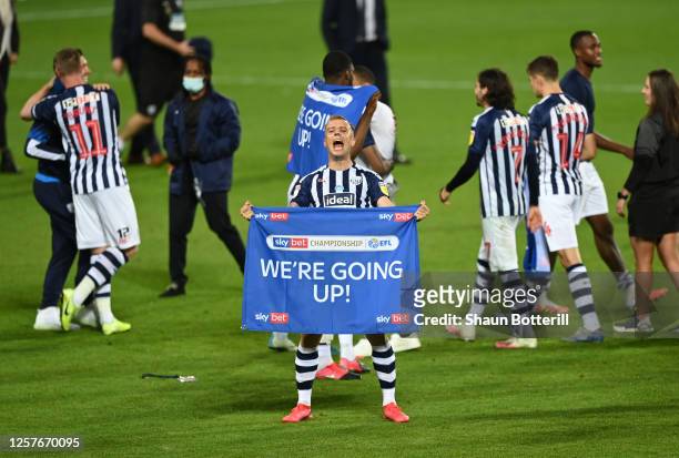 Kamil Grosicki of West Bromwich Albion celebrates promotion after during the Sky Bet Championship match between West Bromwich Albion and Queens Park...