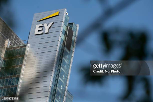 The Ernst and Young logo is seen on a building in on 23 May, 2023 in Warsaw, Poland.