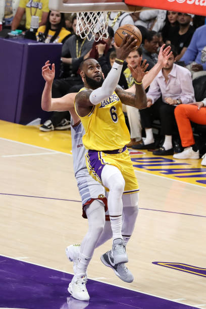 Los Angeles Lakers forward LeBron James drives to the basket during the Denver Nuggets versus the Los Angeles Lakers in Game 4 of the NBA Western...