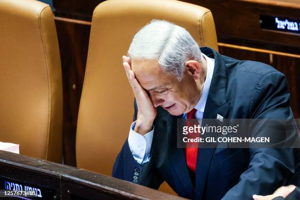 Israel's Prime Minister Benjamin Netanyahu attends the budget session at the parliament in Jerusalem on May 23, 2023.