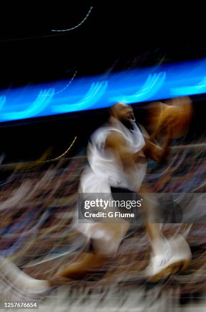 Gilbert Arenas of the Washington Wizards drives to the hoop against the Milwaukee Bucks on December 2, 2005 at the MCI Center in Washington, DC. NOTE...